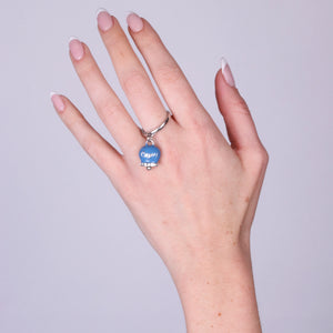 Anello in Acciaio con campanella blu cobalto con scritta Capri