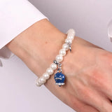 Bracciale in Metallo Bracciale in Metallo con perle e campanella portafortuna in smalto blu con scritta Capri