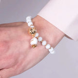 Bracciale in Metallo campanella bianca e piccolo sonaglio con pietre bianche
