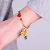 Bracciale in Metallo con riccio di mare placcato oro e cuore