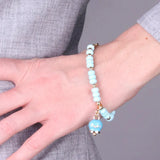Bracciale con campanella Capri e zirconi oro e celesti