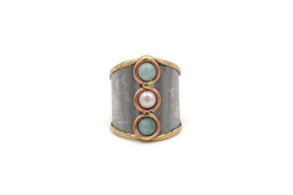 Anello tre pietrine turchesi