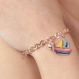 Bracciale con barchetta pendente e mini pumo a lato