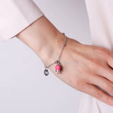 Bracciale con campanella portafortuna pendente