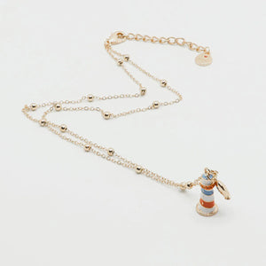 Collana con faro pendente