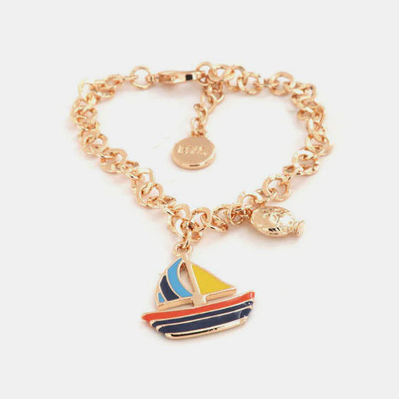 Bracciale con barchetta pendente e mini pumo a lato